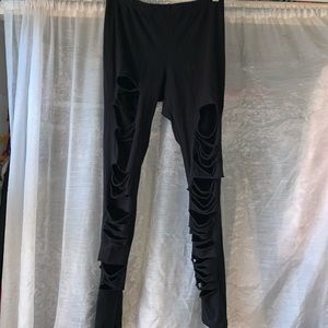 Distressed high waisted black leggings.